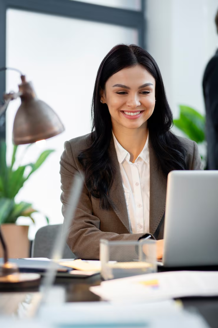 Recruiter reviewing intern applications on a laptop